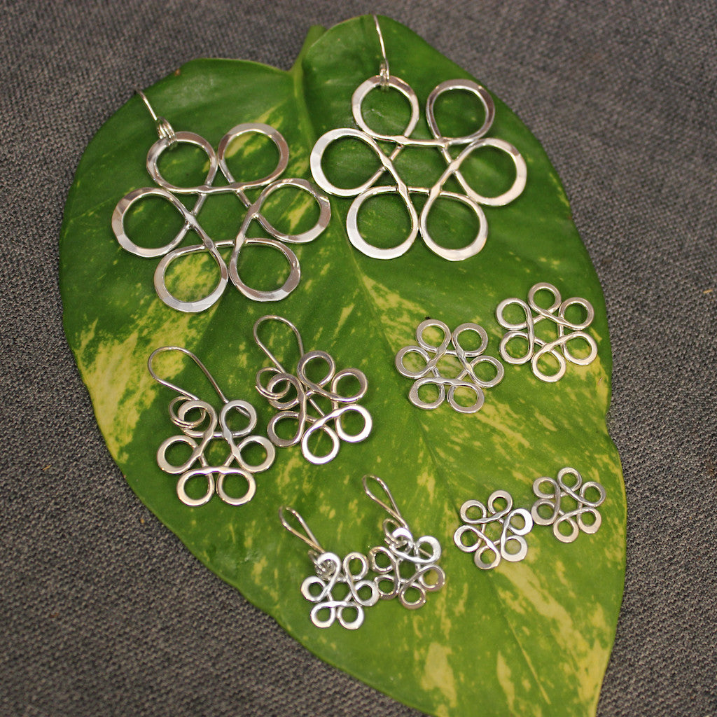 Small, medium and large sized sterling silver flower of life earrings.