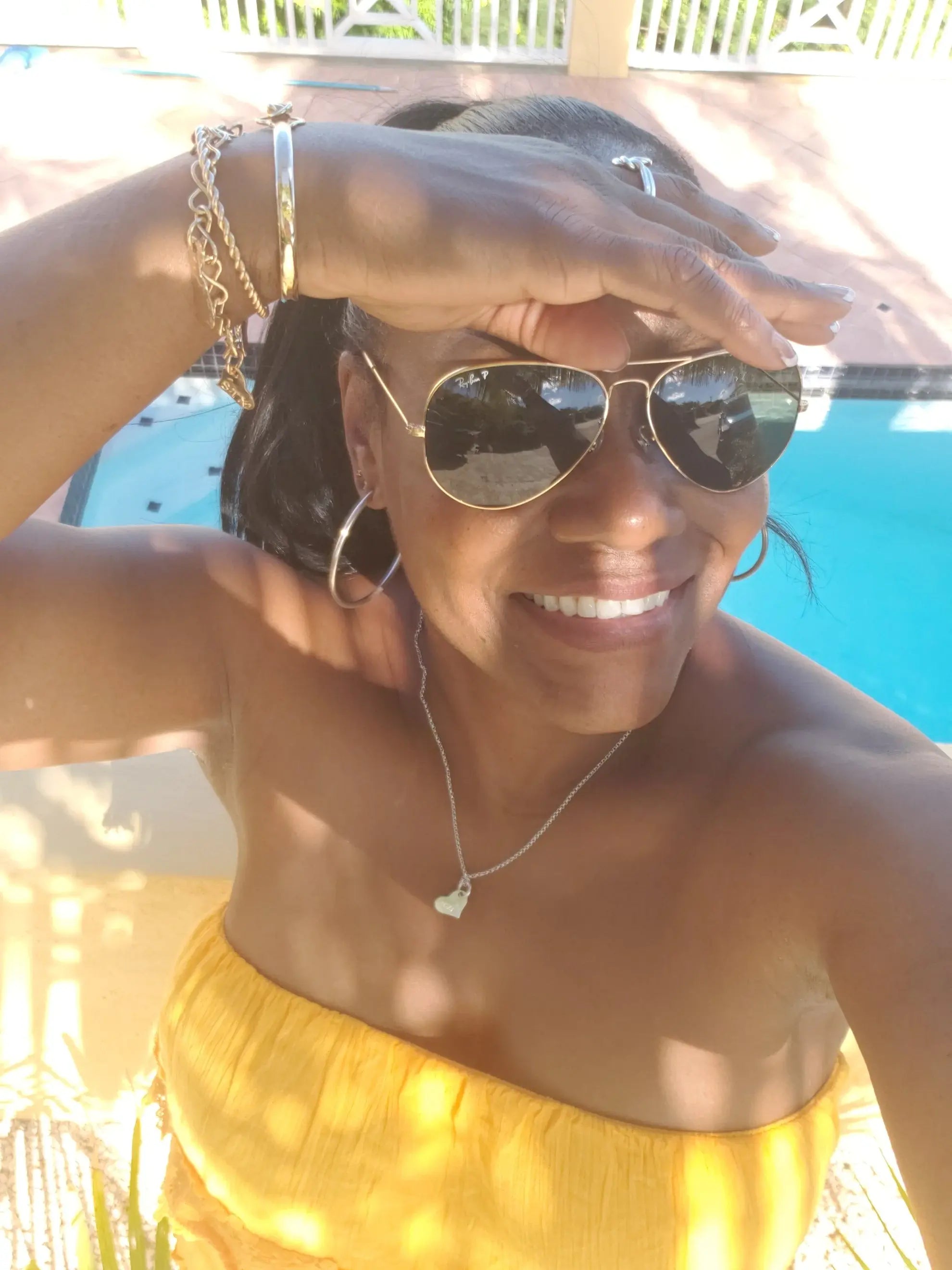 Twisted Gold Cuff, Gold Charm bracelet with several charms, Gold Crucian knot bracelet,  Silver Friendship ring.