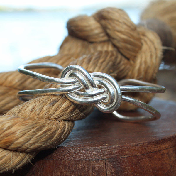 Sterling silver double infinity knot cuff bracelet.