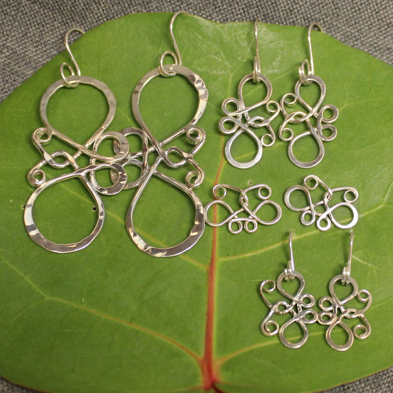 Small and large sterling silver butterfly earrings.