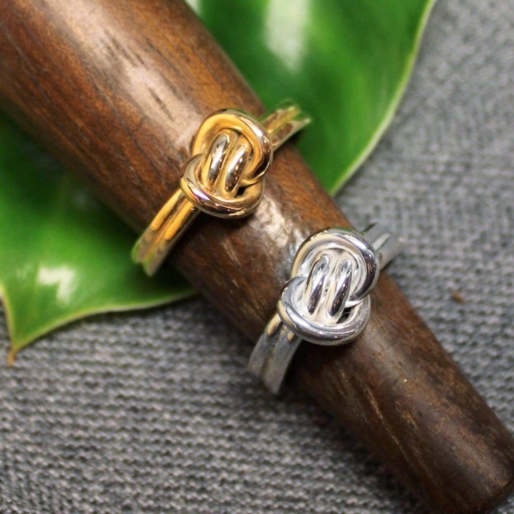 14k gold and Sterling silver Crucian knot rings.