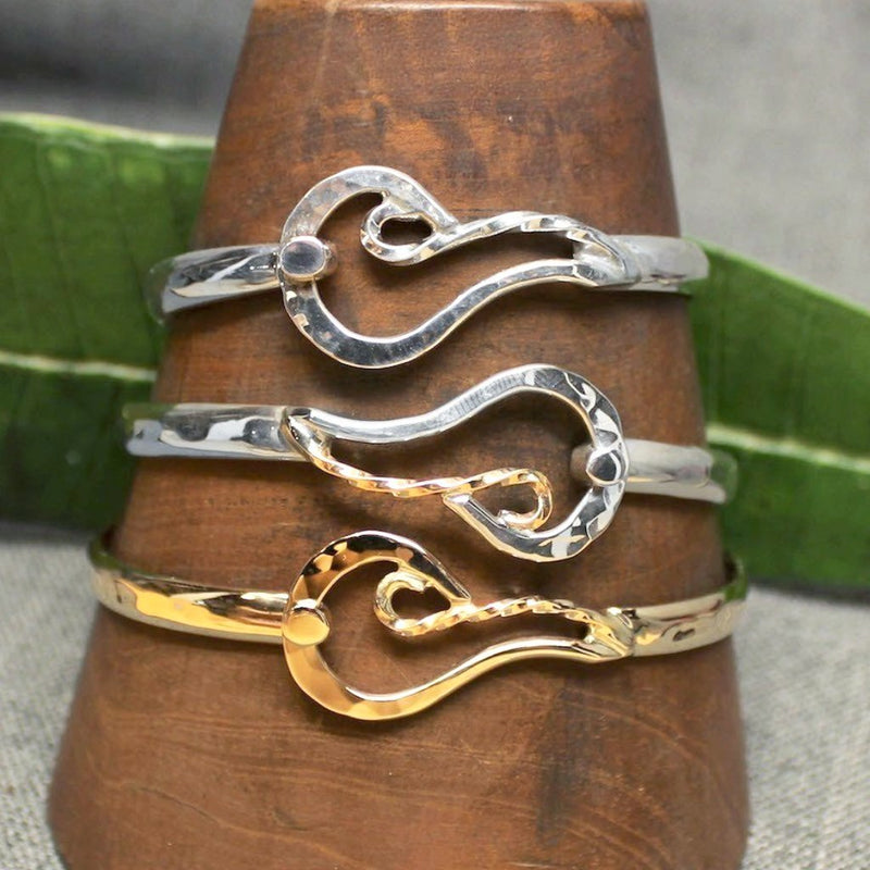 14k gold, Sterling silver and 14k gold with sterling silver classic bracelets with fire design.