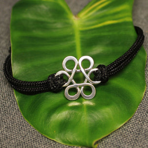 Sterling silver Flower of Life bracelet with black nylon adjustable cord.