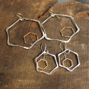 Sterling silver and 14k gold hexagonal 2-tone earrings.