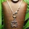 Sterling silver heavy wheat chain with love knot clasp.