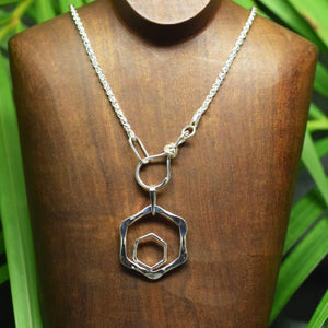 Sterling silver medium wheat chain with love knot clasp.