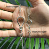 Sterling silver medium wheat chain with love knot clasp.