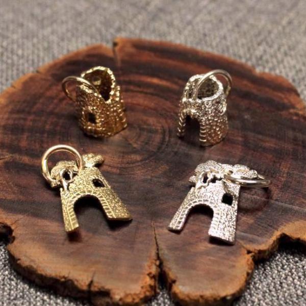 Handcrafted artisanal 3D and flat sugar mill charms.