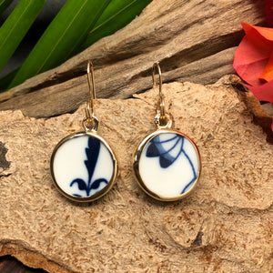 14k gold earrings with round Chaney pieces with white and navy motif